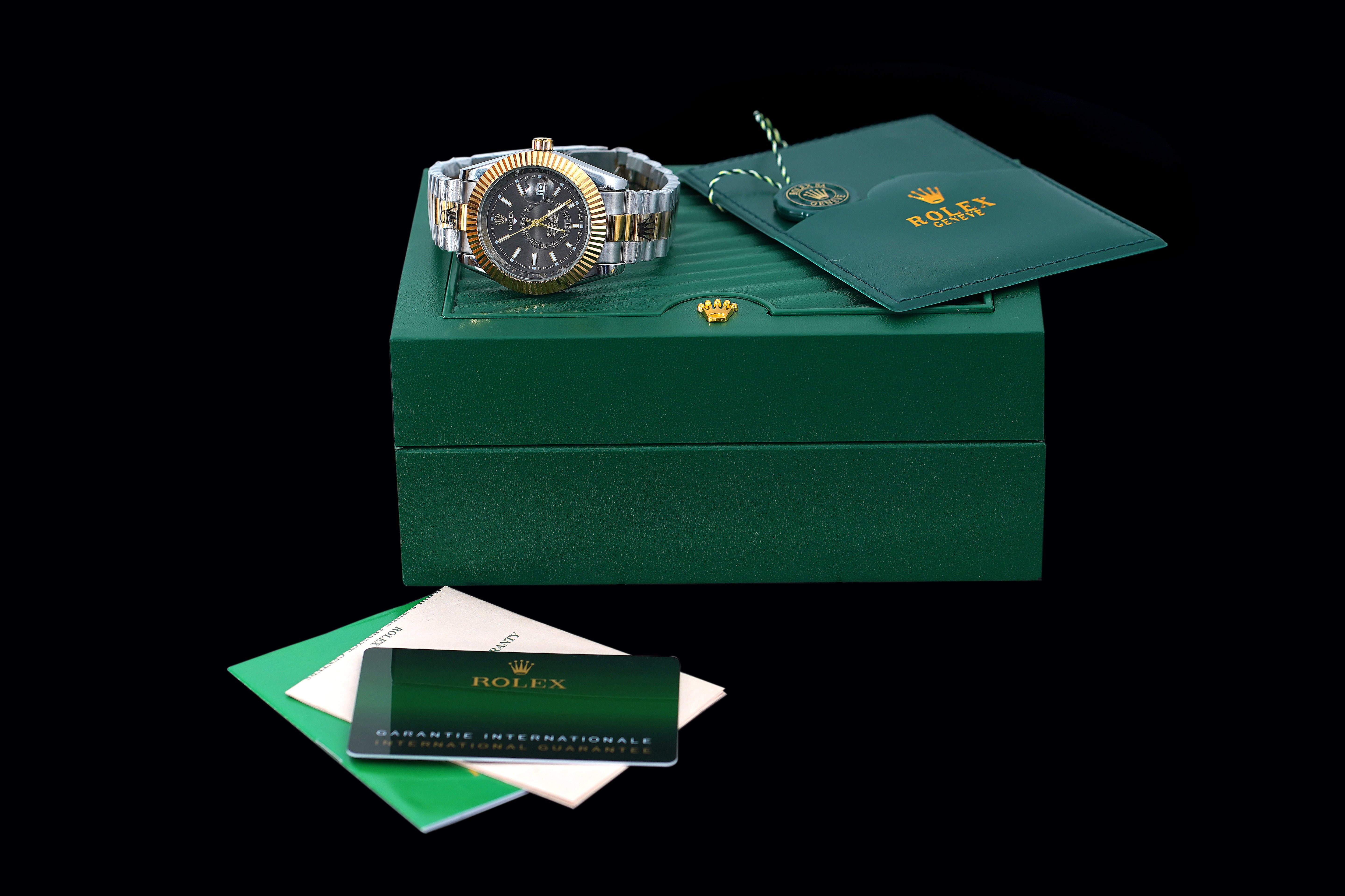 Rolex premium automatic movement silver with black dial.